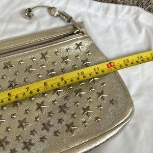 Jimmy Choo zippered clutch !  Gorgeous. Like new!  Soft !